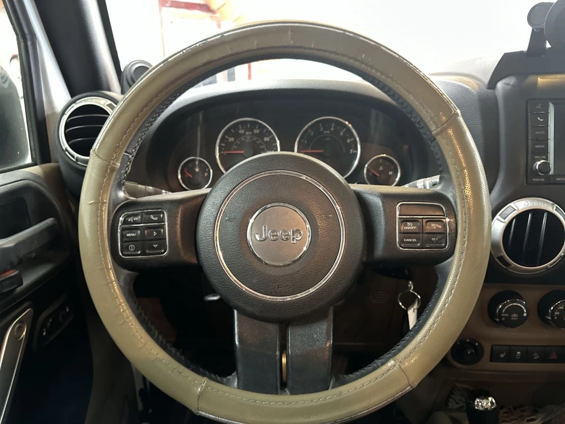 2014 Jeep Wrangler Unlimited Sahara Sport Utility 4D