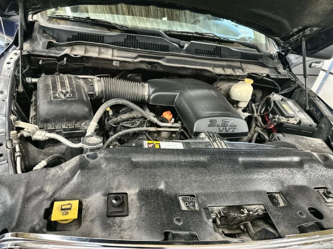 2016 RAM 1500 Quad Cab SLT Pickup 4D 6 1/3 ft